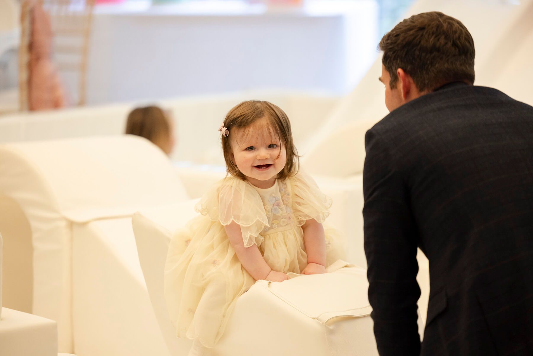 Smiling Baby Girl with Father.jpg